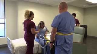 Physical Therapy Transfer Training  How To Transfer From Wheelchair To Bed [upl. by Ruthie]